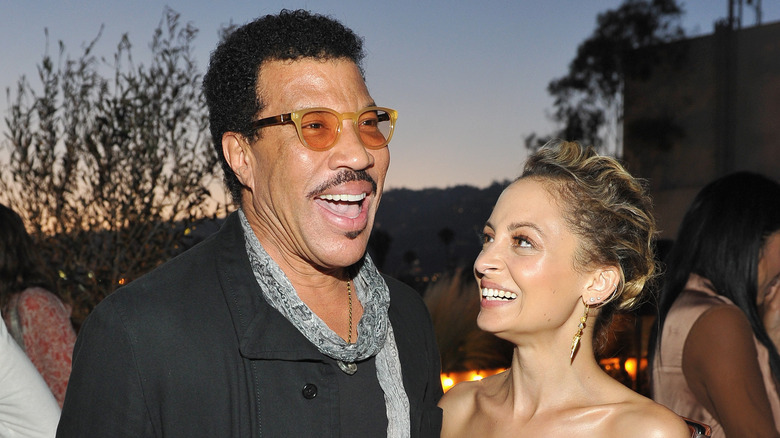 Lionel and Nicole Richie laughing