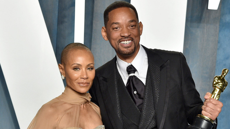 Will Smith and Jada Pinkett Smith posing