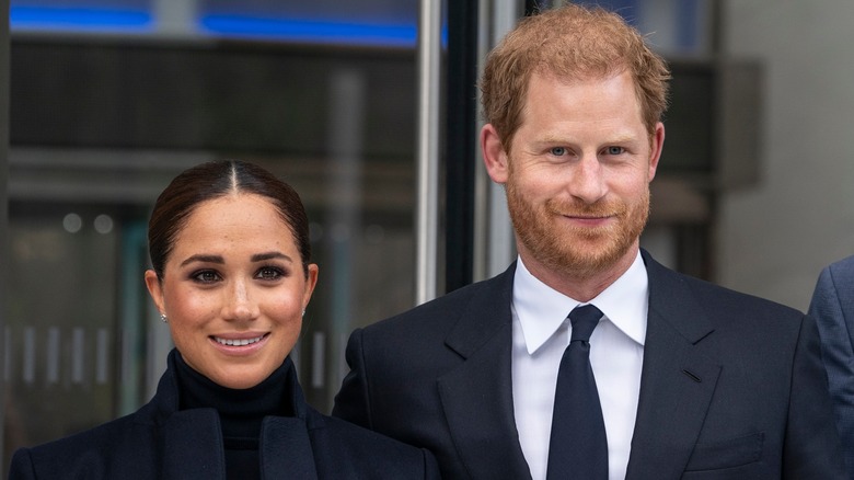 Prince Harry and Meghan Markle smiling