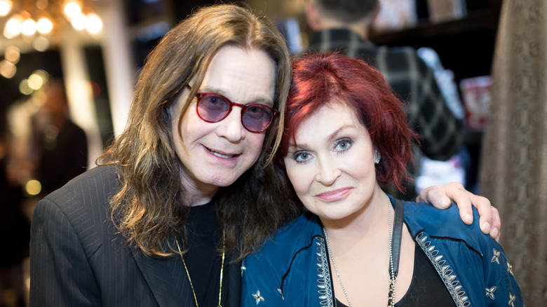 Sharon Osbourne and Ozzy Osbourne posing