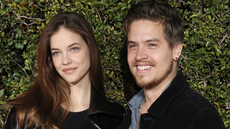 Dylan Sprouse with Barbara Palvin posing