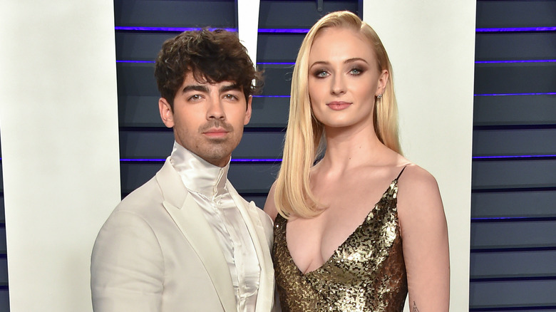 Joe Jonas with Sophie Turner posing