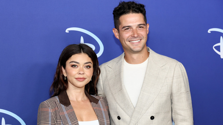 Sarah Hyland with Wells Adams posing