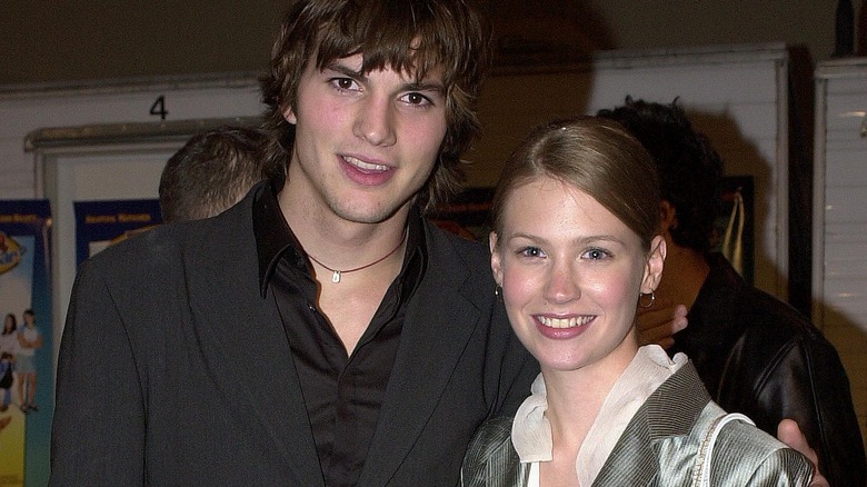 Ashton Kutcher and January Jones smiling