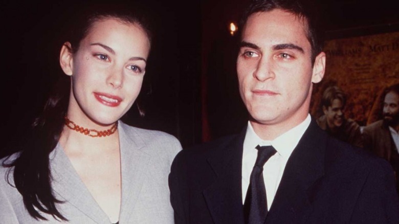 Liv Tyler and Joaquin Phoenix posing together