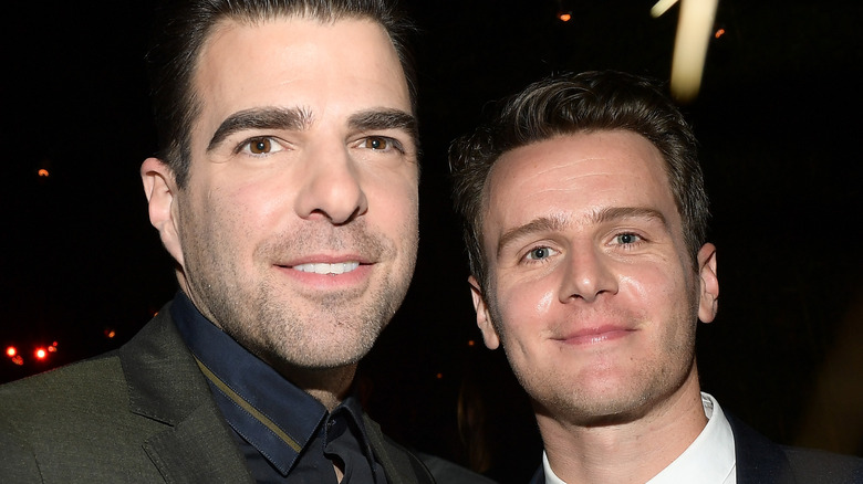 Zachary Quinto and Jonathan Groff smiling