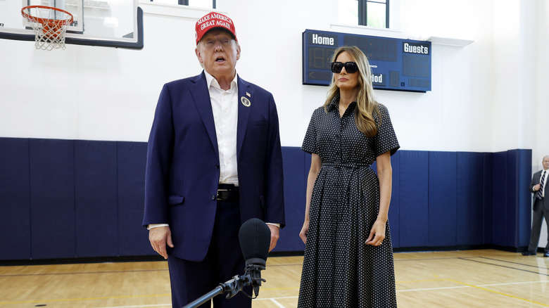 Donald Trump speaking beside Melania Trump at Barbara Mandel Recreation Center on Election Day 2024