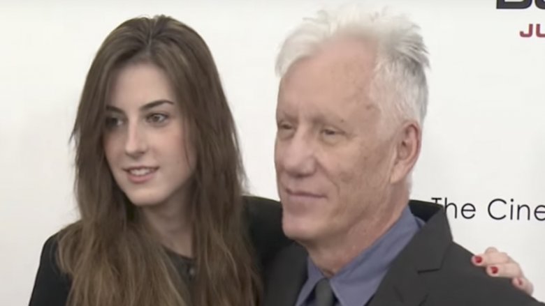 James Woods and Kristen Bauguess with their arms around each other