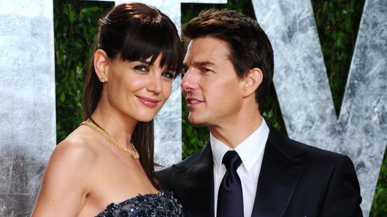 Katie Holmes and Tom Cruise chatting on the red carpet