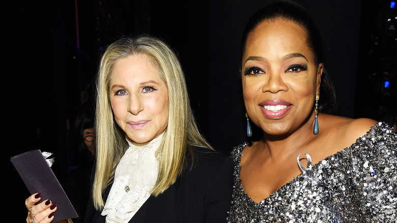 Barbra Streisand and Oprah Winfrey smiling