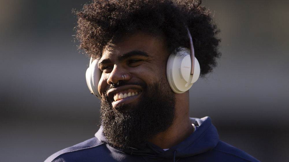 Ezekiel Elliott wearing headphones