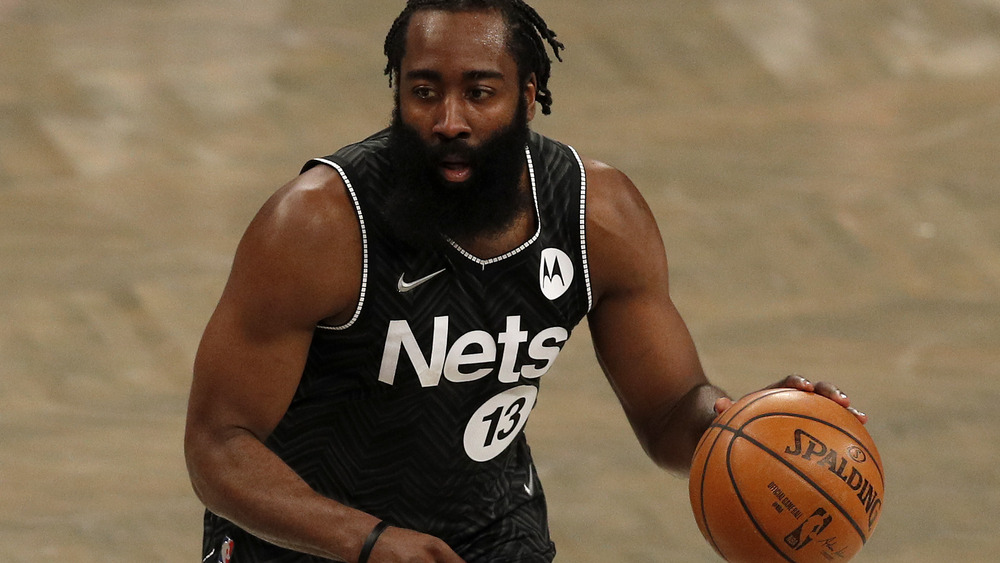 James Harden dribbling basketball 