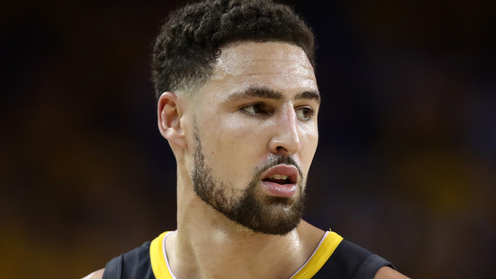 Klay Thompson looking away