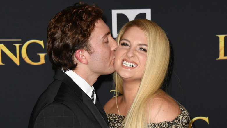 Daryl Sabara kissing Meghan Trainor's cheek