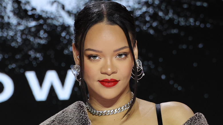 Rihanna wearing silver hoop earrings