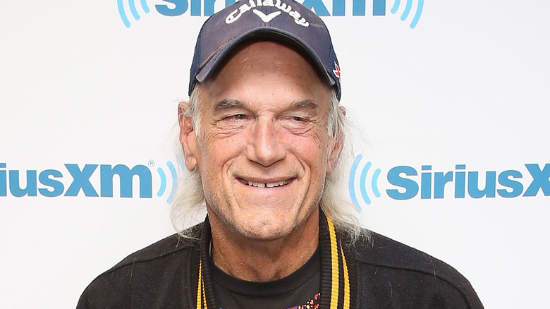 Jesse Ventura with hat, smiling