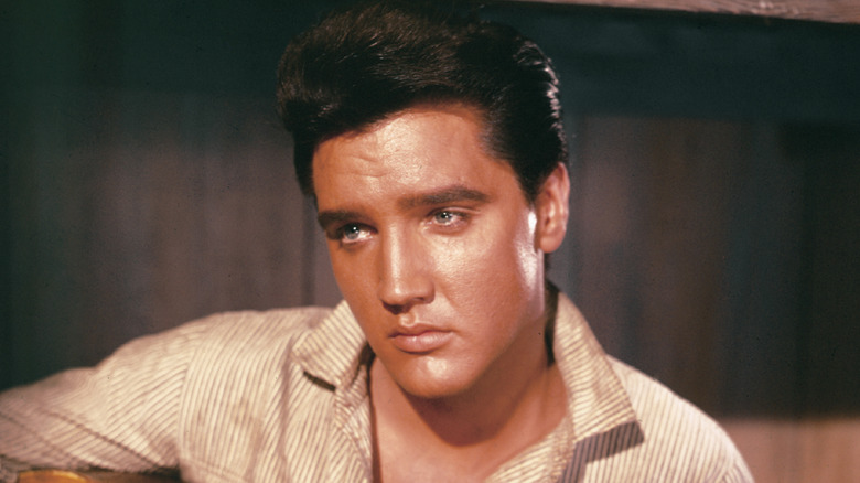 Elvis Presley looking dour