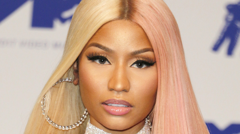 Nicki Minaj diamond hoops, looking on