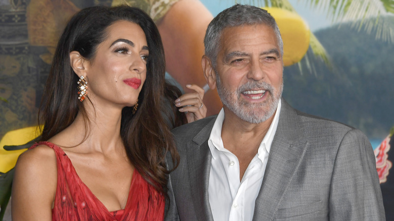 George Clooney, Amal Clooney posing