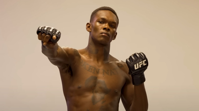 Israel Adesanya posing