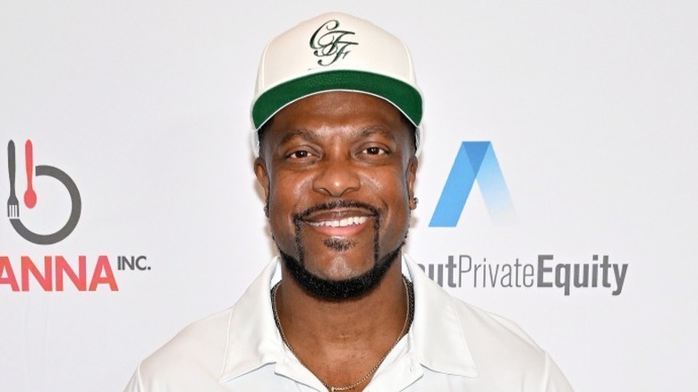 Chris Tucker wearing hat