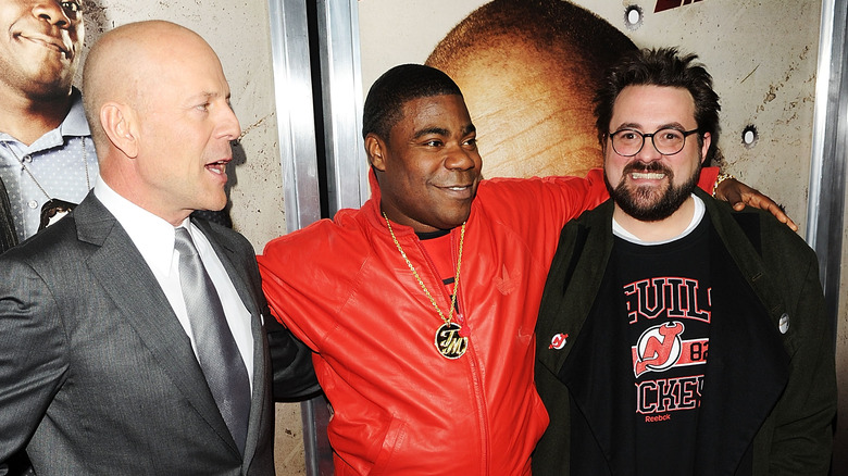 Bruce Willis, Tracy Morgan, and Kevin Smith posing