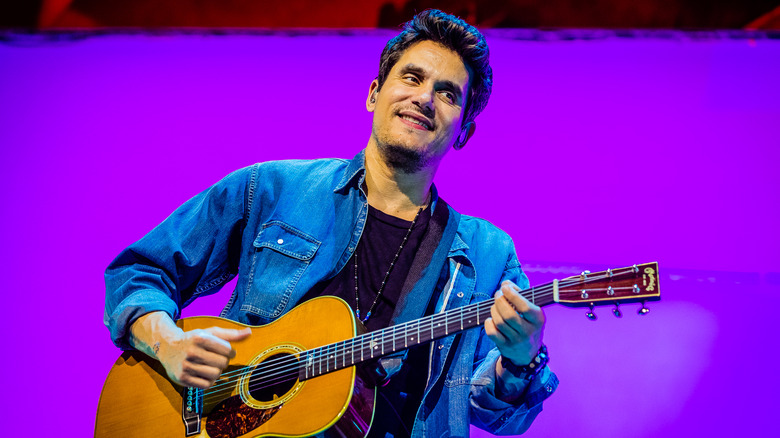 John Mayer playing guitar