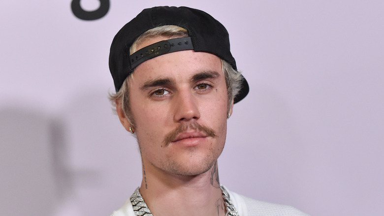 Justin Bieber wearing a hat