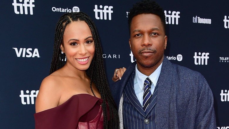 Leslie Odom Jr. and Nicolette Robinson posing at a film festival