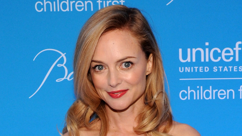 Heather Graham at an event, smiling