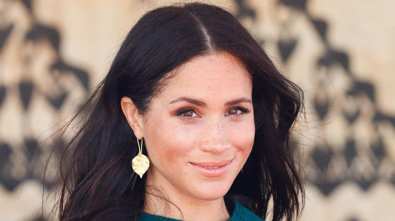 Meghan Markle at an event, smiling