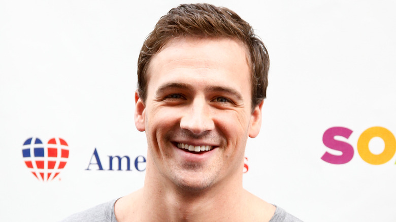 Ryan Lochte at an event, smiling