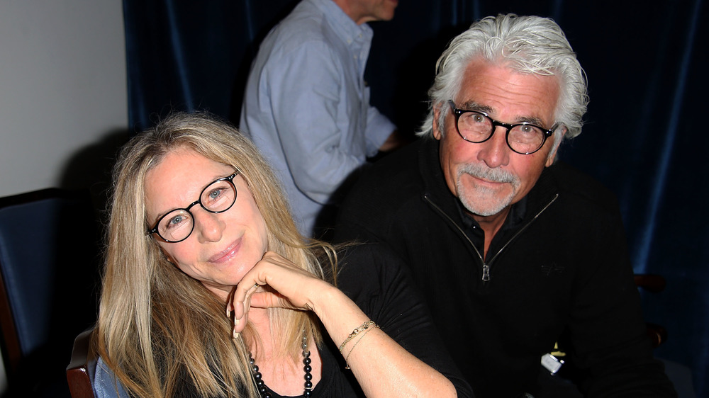 Barbra Streisand and James Brolin looking at camera