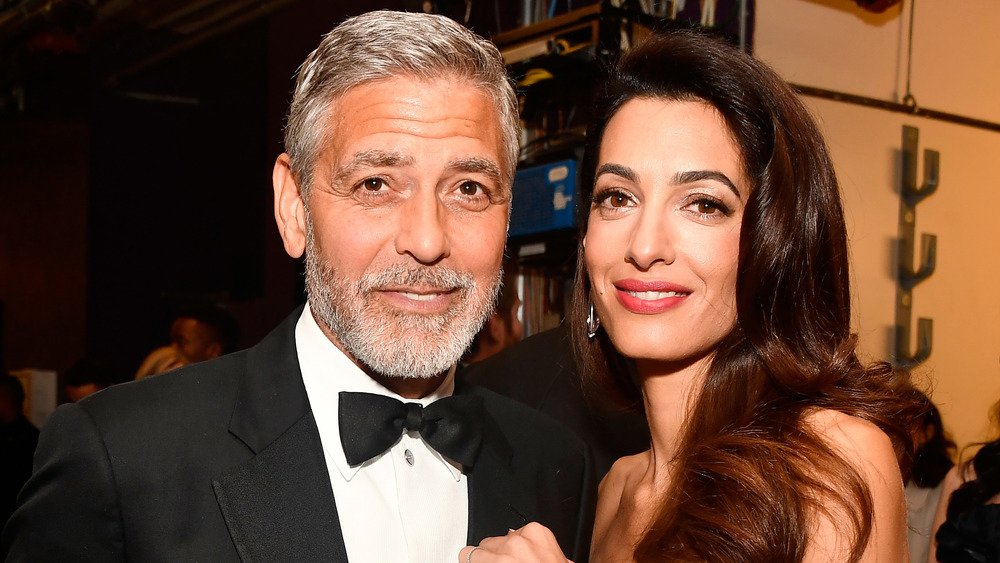 George Clooney and Amal Alamuddin smiling