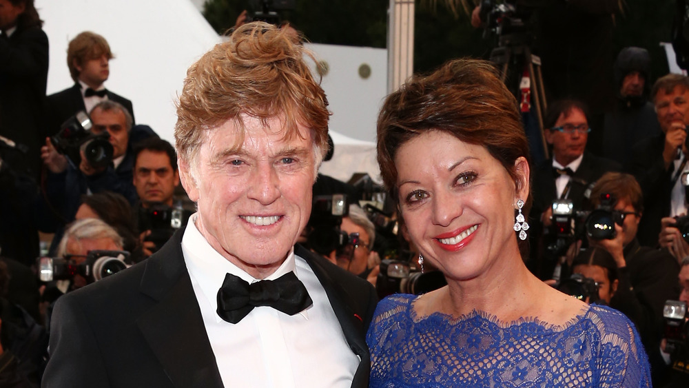 Robert Redford and Sibylle Szaggars smiling