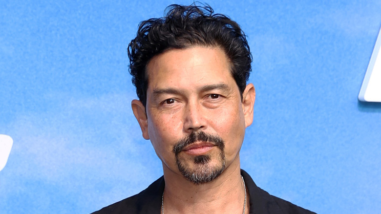 Anthony Ruivivar posing at a premiere 