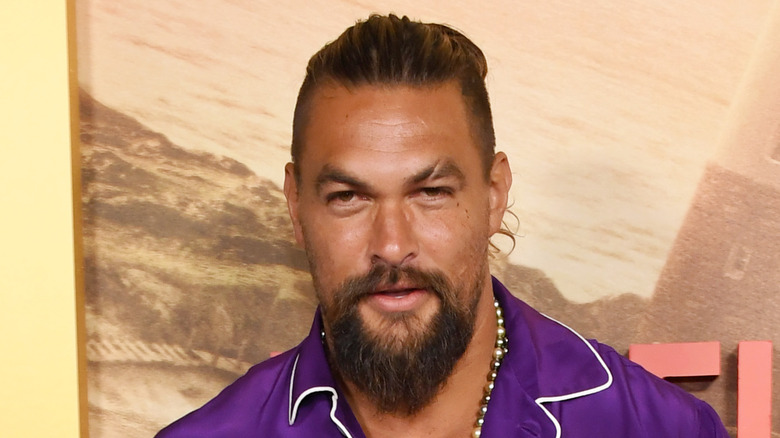 Jason Momoa posing at an event