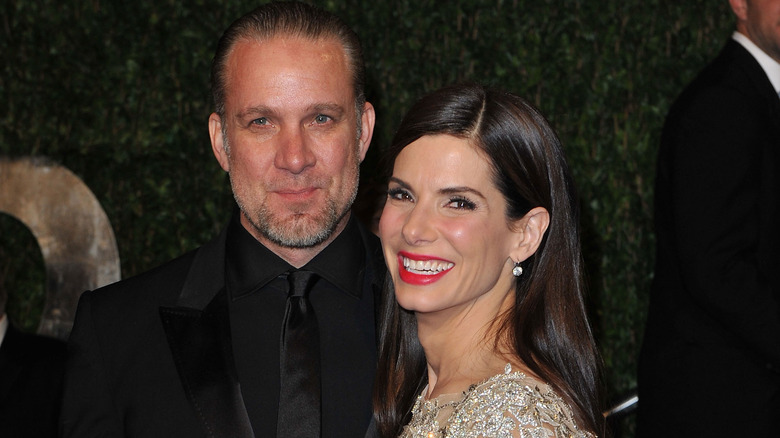 Jesse James and Sandra Bullock smiling