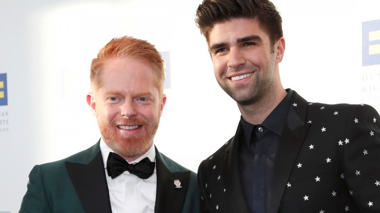 Jesse Tyler Ferguson and Justin Mikita at an event