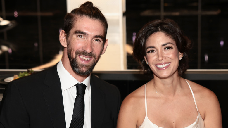 Michael and Nicole Phelps smiling