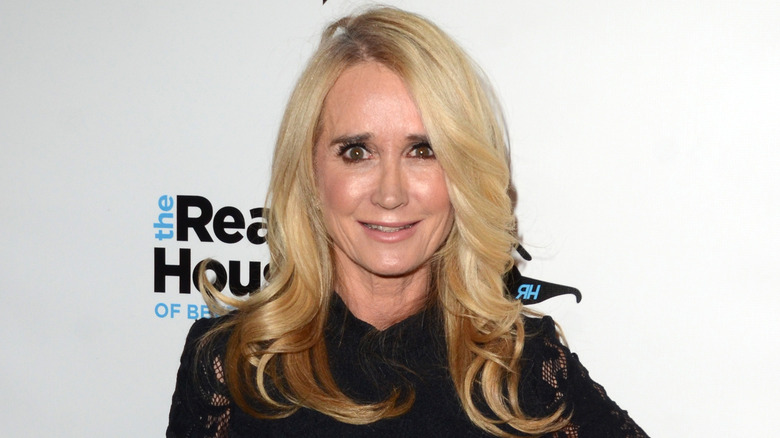 Kim Richards in black dress