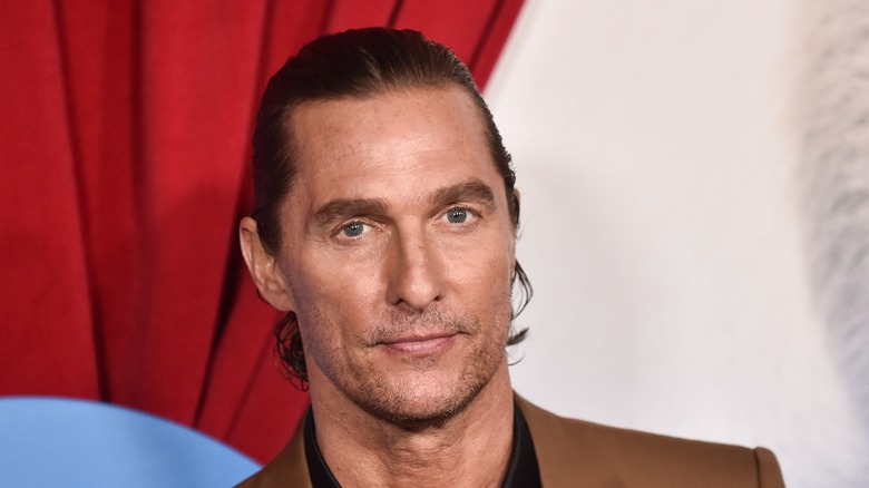 Matthew McConaughey wears black suit
