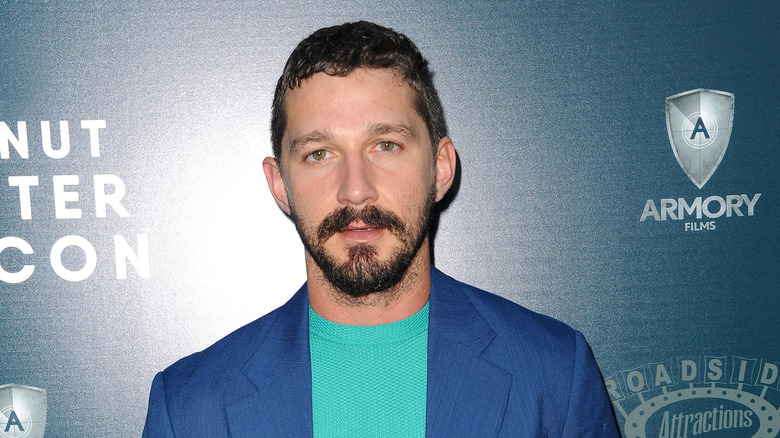 Shia LaBeouf in a green shirt