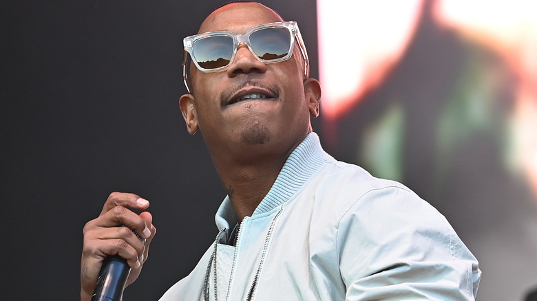 Ja Rule performing in sunglasses