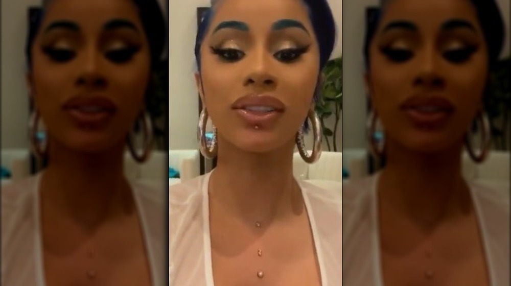 Cardi B's lip and chest piercings