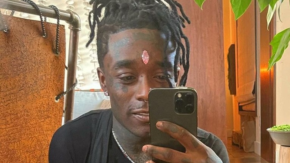 Lil Uzi Vert with a pink diamond in his forehead