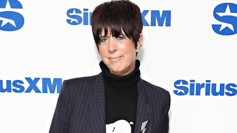 Diane Warren wearing a black turtleneck and grey striped turtleneck