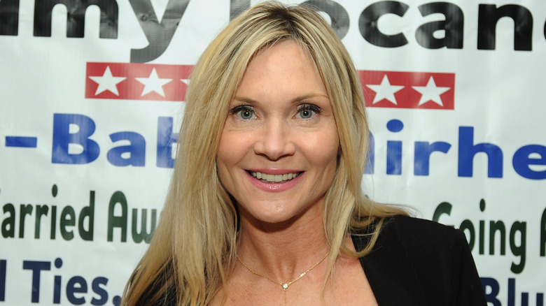 Amy Locane smiling