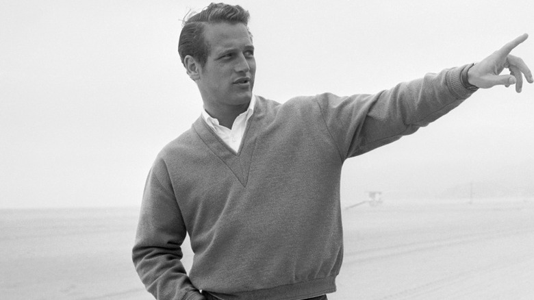 a young Paul Newman pointing