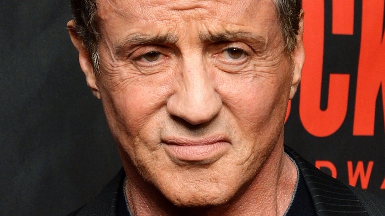 Sylvester Stallone posing on the red carpet